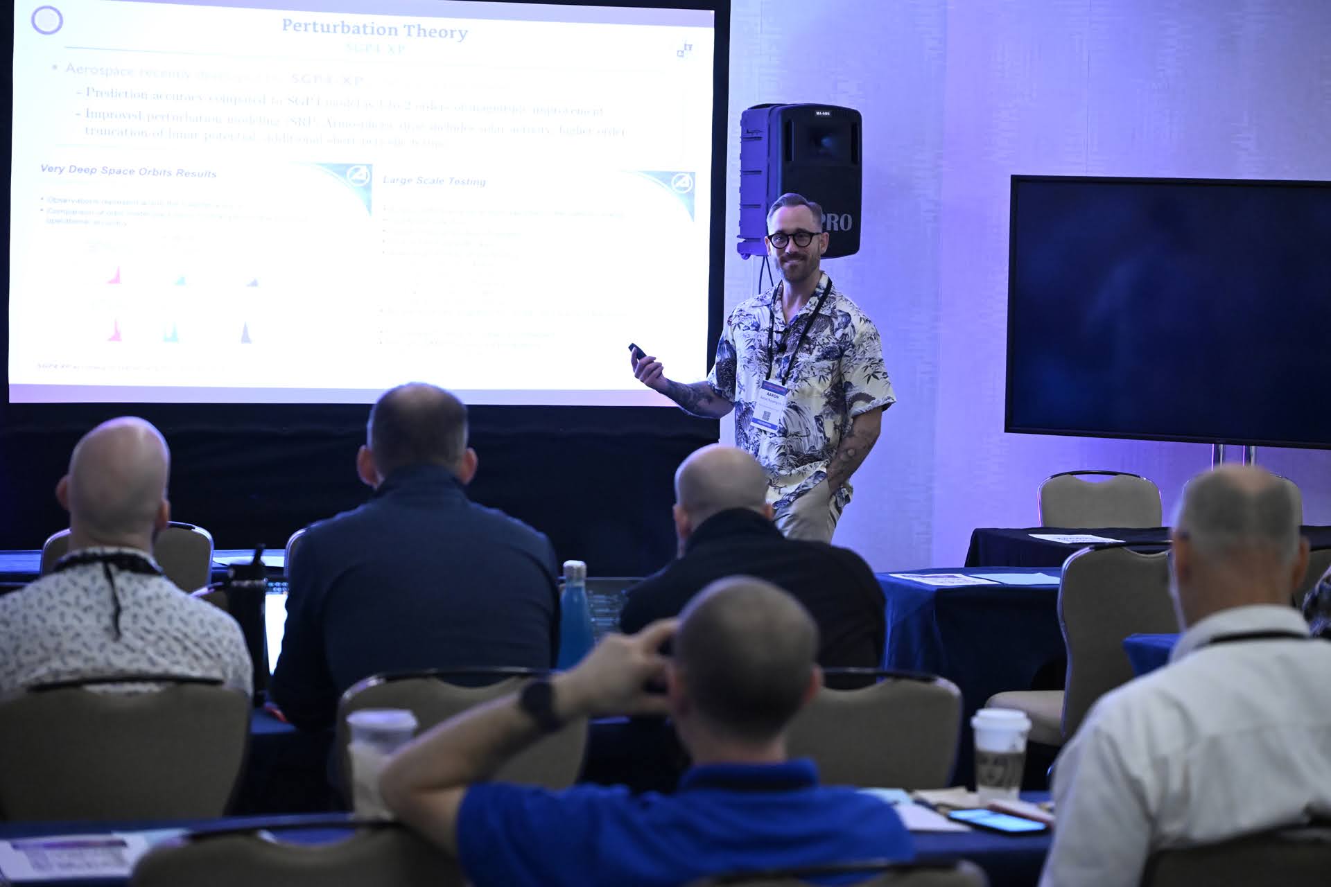 Aaron Rosengren leading a technical short course on astrodynamics at AMOS 2024