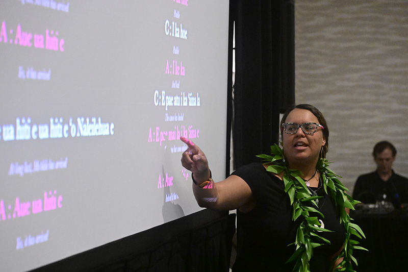 Dr. Brittany Kamai teaches the delegates an Oli